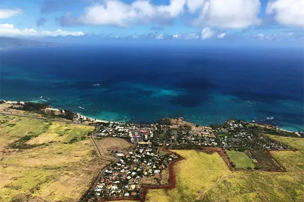 Aeria shot of Paia with the ocean in the background. 