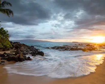 Beach at sunset in Maui, Hawaii.