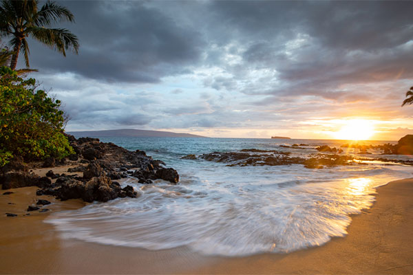Beach at sunset in Maui, Hawaii. 