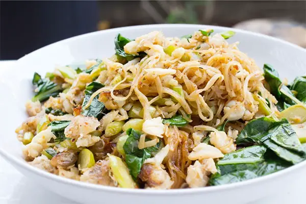 Thai noodles in a white porcelain bowl.