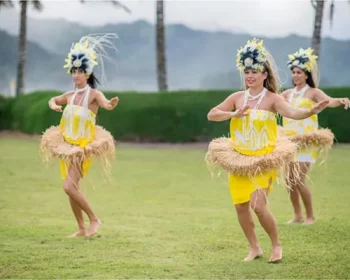 Women performing traditional luau.