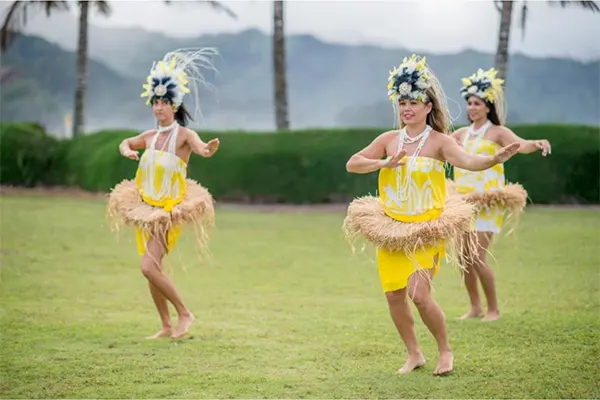 Women performing traditional luau. 
