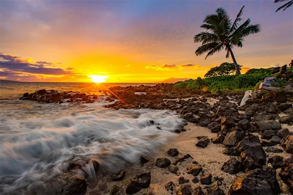 Long exposure sunset on a rocky beach. 