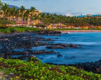 Long exposure picture just after sunset during blue hour of the coast of Wailea Beach on Maui island, Hawaii