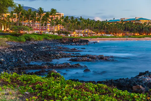 Long exposure picture just after sunset during blue hour of the coast of Wailea Beach on Maui island, Hawaii