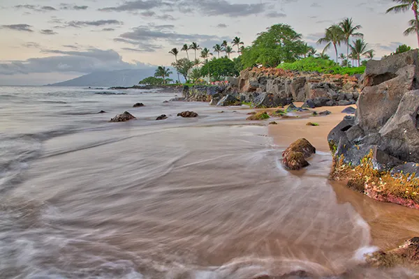 Start of sunset at Wailea Beach in Wailea, Maui, Hawaii