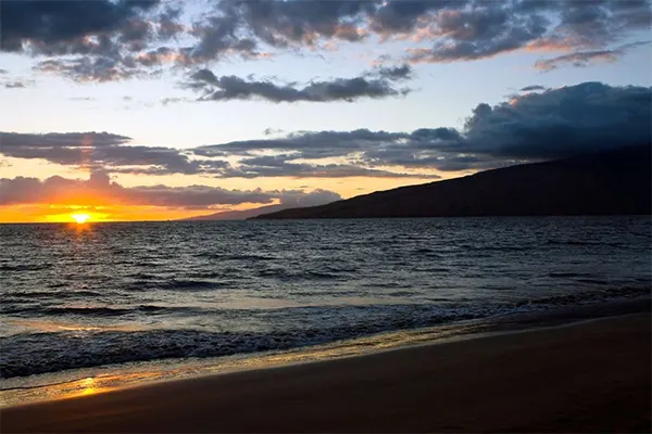 Sunset over a beach.