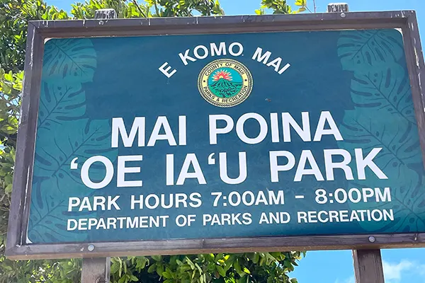 Entrance sign at Mai Poina Oe Lau Park. 