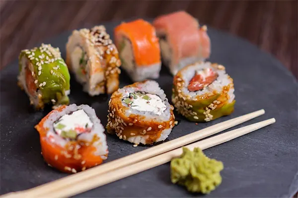 Close up shot of sushi with wasabi.