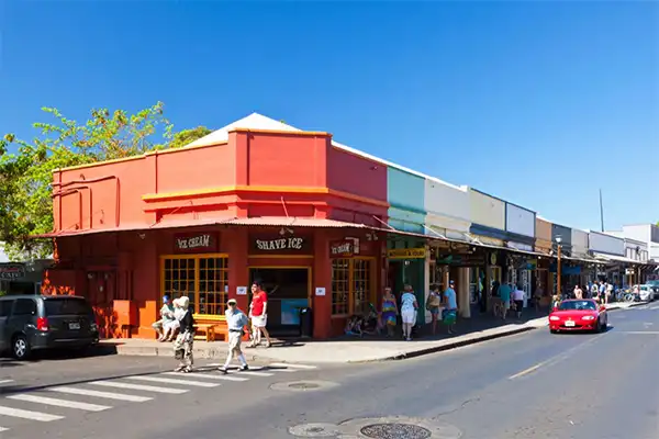 Street in Maui with a business selling shave ice and ice cream. 