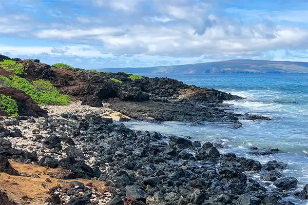 Palauea Beach's rocky beachfront in Maui. 