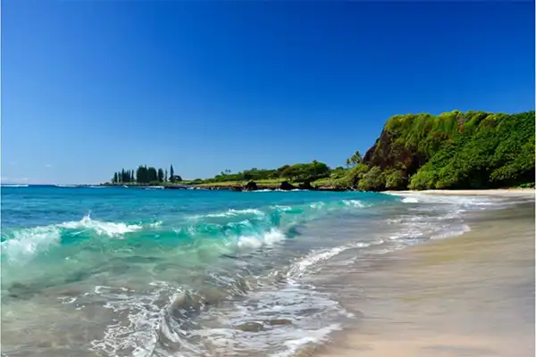 Hamoa Beach in Maui on a clear blue sky day. 