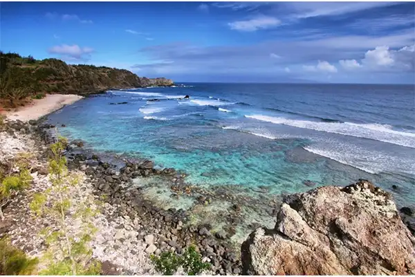 A rocky beach on Maui on a gentle summer day. 