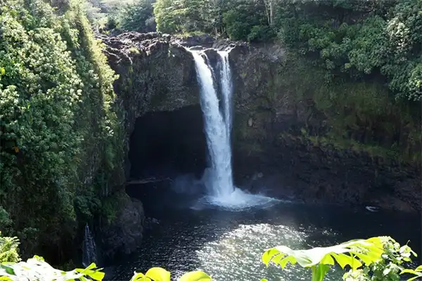 A waterfall falling into a pool in Maui.