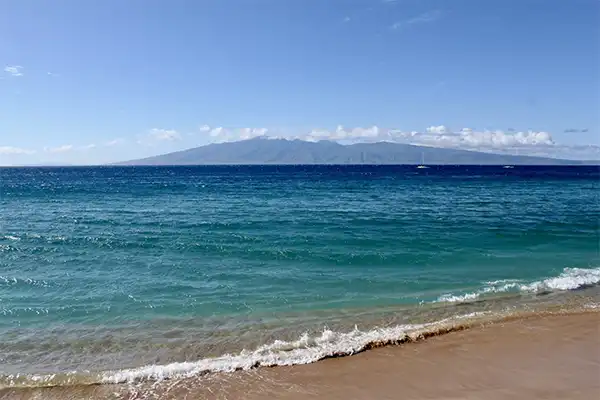 Looking out at the gentle waves of Kaanapali Beach in Maui. 