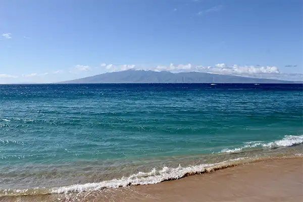 Looking out at the gentle waves of Kaanapali Beach in Maui.