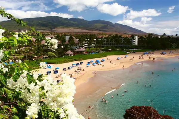 A beach in Kaanapali lined with resorts. 